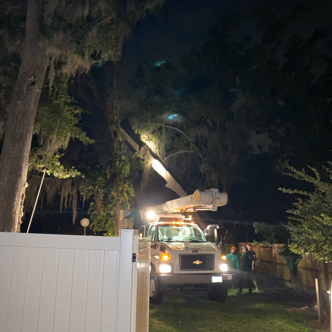Night emergency response crew under flood lights